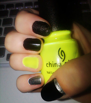 Black - China Glaze (Liquid Leather)
Yellow - China Glaze (Celtic Sun Neon)
Silver - Nicole (Positive Energy)

Black nail texture was done with sugar; 2 coats of color, on the second coat dip in sugar, let dry for 15 mins then soak your finger in water to dissolve the sugar.