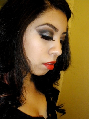 This look was part of a makeup series for the Seven Deadly sins. This represents lust, the bright, seductive, lips and a smokey bedroom eye. :) 
