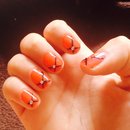 Cross style nail varnish with gems