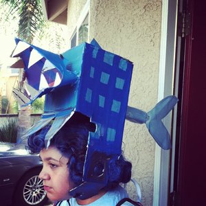 Crazy Hair Day at my youngest sister's school. (10-06-2011)
Gave her Oompa Loompa inspired, blue pin-curls, haha. 