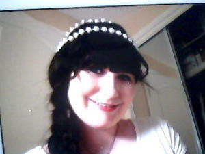 This is a pic of my hair , it is a big plete with beads round my head and some little curls !