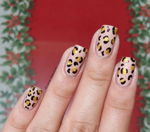 For Katrice's version: http://www.beautylish.com/f/rpyzjig/leopard-twin-nails-with-ariane-p