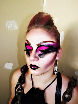 Challenge day 1: Pink, makeup by me on a model, bright pink and black bold rocker makeup. 