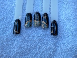 I used nail foils on this nail. It reminds me of looking at earth from space :)