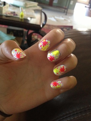 white base coat 
pink dot & yellow dot
use toothpick to spread out edges
make smaller dots 