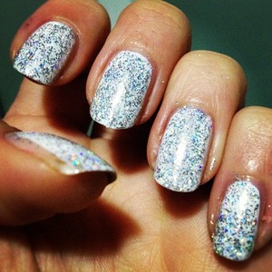 http://shveppes.tumblr.com/post/19405445959/glitter-nails