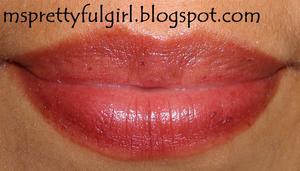 L'Oreal HIP Brilliant Shine Lip Gloss
in 748 Enchanting.
http://msprettyfulgirl.blogspot.com/2011/11/eotd-grassy-knoll.html
