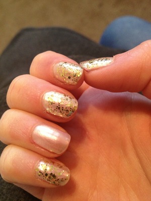 Gold glitter on a pearly polish! 
