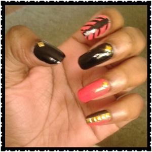 Colors used: Sally Hansen Hard as Nails 880 Black Heart and 420 Mighty Mango