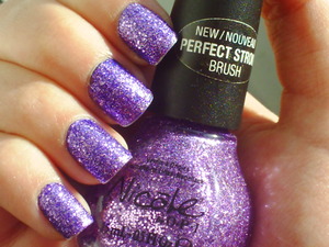 Nicole by OPI in the colour One Less Lonely Glitter from the Justin Bieber One Less Lonely Girl collection.