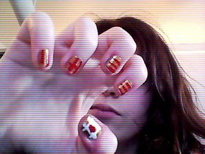 Made a tic-tac-to on my thumb and put a red dot in it :) Thought it looked KINDA like Valentine's haha. It reminds me of a carnival :)