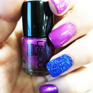 Purple polish with blue glitter 