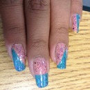 pink and turquoise patterned glittery nails 