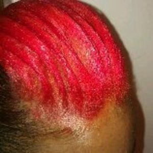 Hair colored & Curled into Fishscale with weave ponytail attached