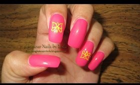 GNbL- Pink polish with a Yellow vinyl decal