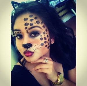 This is a halloween look I did on myself. Leopard print. More than 3 products were used, but only 3 showed. 