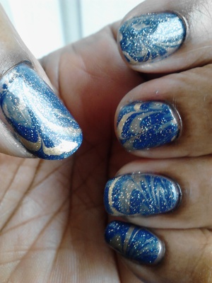 Showing my supporty by using my son's football team colors for his game tonight. Sally Hansen "Thinking Of Blue" , Essie "Shifting Power" & China Glaze "Golden Enchantment"