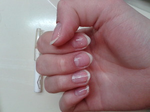 With top coat, french manicure look, natural