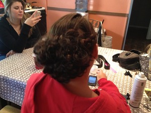 This is a hairstyle I did for prom :) it was a side French braid into a curly bun 