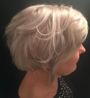 Double Process Blonde using #PaulMitchell #Synchro Lightener , toned to a pale silver blonde.