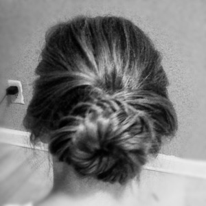 fishtail hair all the way to the bottom of your hair then twist it around to make a bun pin it back with bobby pins :)