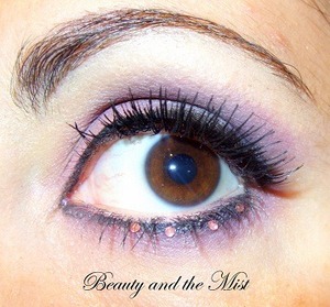An eye make up in purple