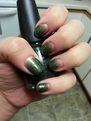 a gradient effect acheived by layering. emerald being extremley trendy this year.