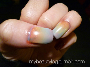 An Evening in the City nails. I based these gradients on a painting by Tzviatko Kinchev. I also tried to gradient my nail stamps, but I guess my polishes aren’t too nail stamp friendly, haha. Well, I tried!

mybeautylog.tumblr.com