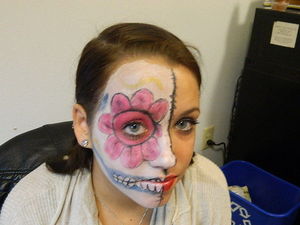 My first attempt at a sugar skull on my friend Alexis
