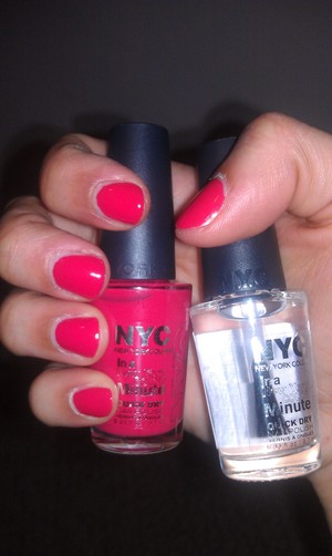 Here I used Times Square, a unique hybrid of pink and red. (although the image shows more of the nail polish's pink qualities). For a top coat I used NYC's Grand Central Station.  Drying time was pretty decent, and it left a nice shine!