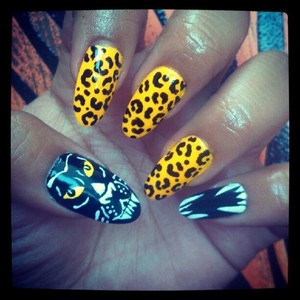 Leopard print, fangs, panther, Oh my!