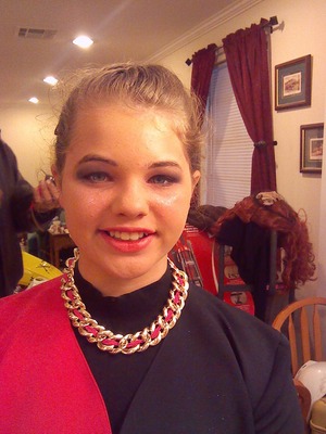 my little sister's Mardi Gras makeup I did for her awhile ago. 