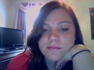I was playing around with my webcam and took some still shots. I liked the utterly bored look on my face .