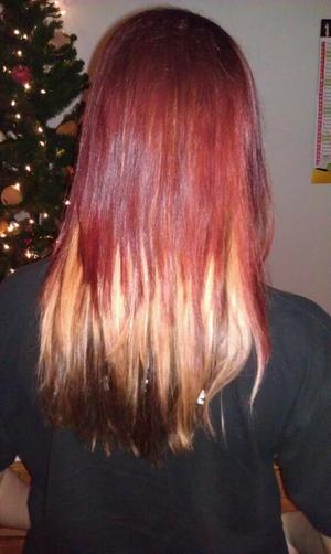Not a great photo but this was my hair a few months ago. Cut it into three layers and then dyed each one a different color. (Red, blonde, and brown) I loved it! I might go back to it after summer is over.