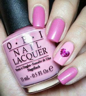 The heart on the accent nail is made up of magenta hex glitters :)