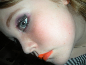 Pink and black with orange lips :P ... Again a strange one.
