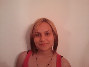 color correction first.....color medium chocolate....highlighted......then i cut. afterward i did a natural look for her make- up ...i used a light pink shimmer...black mascara....lip gloss w/ a tint of pink and finally i arched her eyebrows