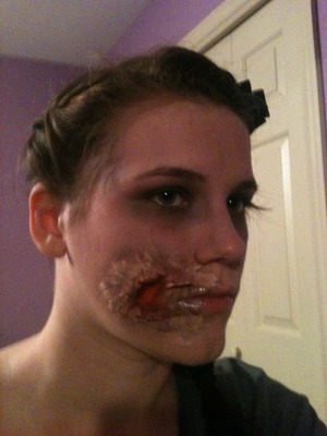 This s what I was for Halloween. I did this with glue, toilet paper, and make up