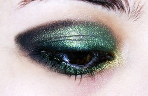 Green and Golden shimmering eye shadow.