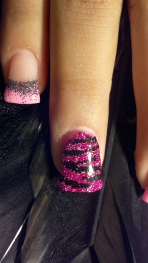Zebra print nails done with micro beads