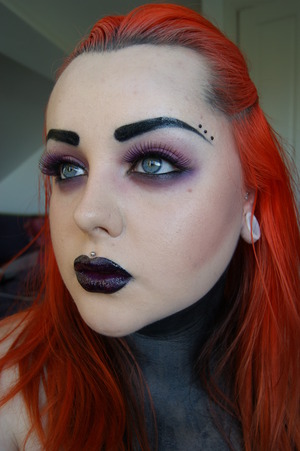 Inspired by Tim Burton and a collection of his films.

Eyelashes were a random buy off ebay which I don't know the name of. But they are black lashes infused with purple.

www.facebook.com/Shonaelunedmua
