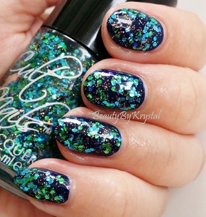 Cult Nails Time Traveler (navy blue) with Dance All Night on top (glitter, blue, green, gold) topped with Wicked Fast top coat.
My Bday Mani: http://www.beautybykrystal.com/2014/04/my-birthday-manicure.html