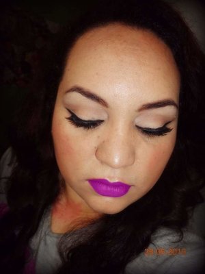 Purple lips and cat eyes with #lagirl 