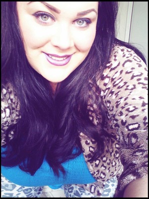Purple tint hair with matching lipstick 