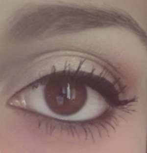 black eye liner with gold and brown eye shadow