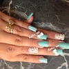 Bow nails with pearls 