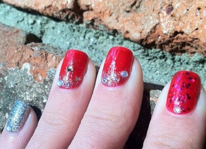 Red jelly base with silver glitter gradient and rhinestones <3