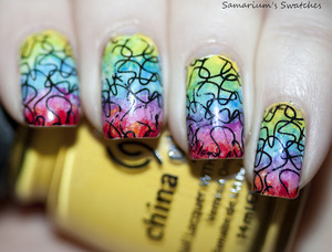 Stamped Rainbow Water Color Mani

http://samariums-swatches.blogspot.com/2012/02/stamped-rainbow-water-color-mani-cheeky.html