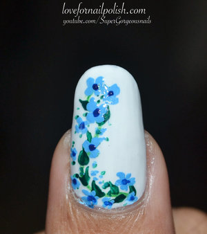 For details visit http://lovefornailpolish.com/pastel-flower-nail-art-cute-flower-design-for-spring