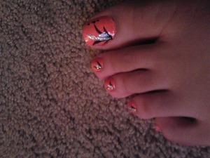 first time doing nail art on my toes what do u think srry my toes look kibda weird